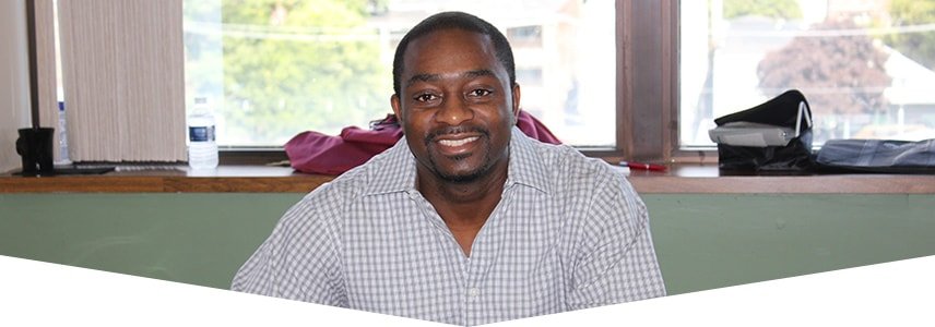 Male employee sitting at a desk